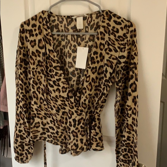 H&M Tops - Cheetah print wrap blouse